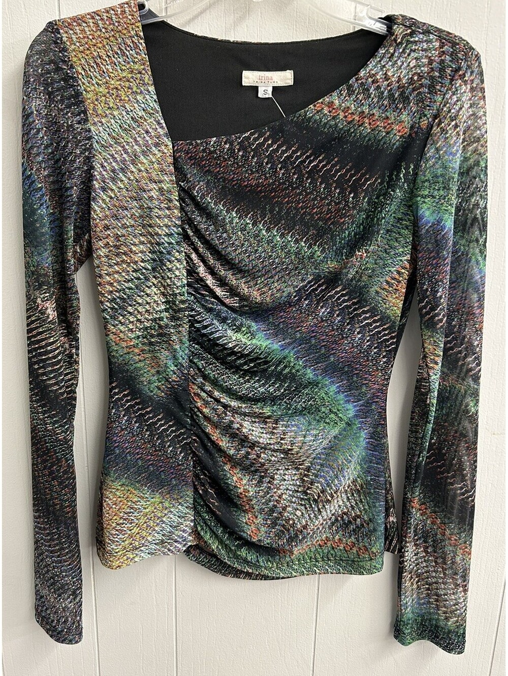 Trina Turk Blouse.  Dark Colors Geometric Pattern. Ruched Front. Size S.  EUC.